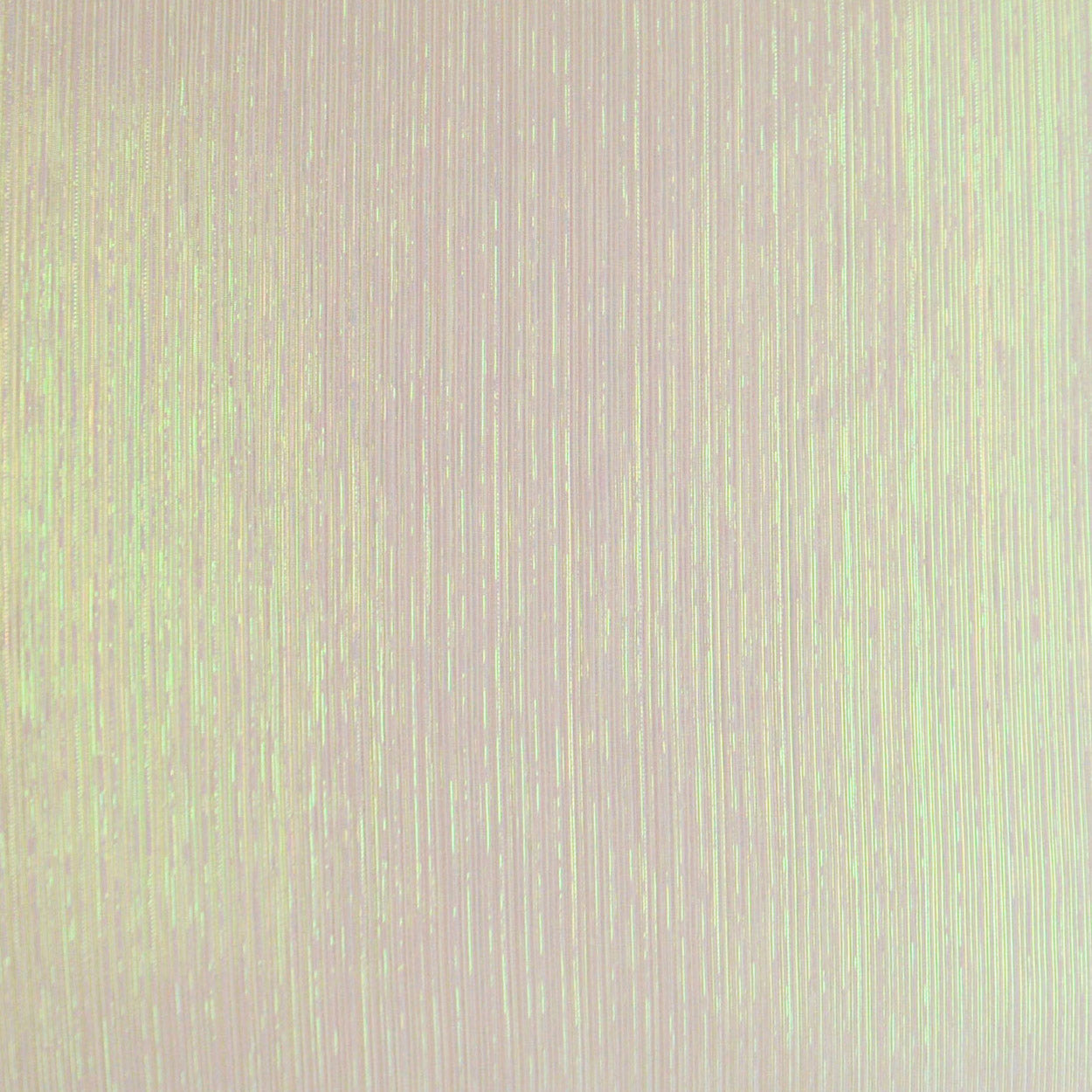 Pale pink iridescent fabric with fine vertical weave and subtle shimmer; lightweight textile for apparel.