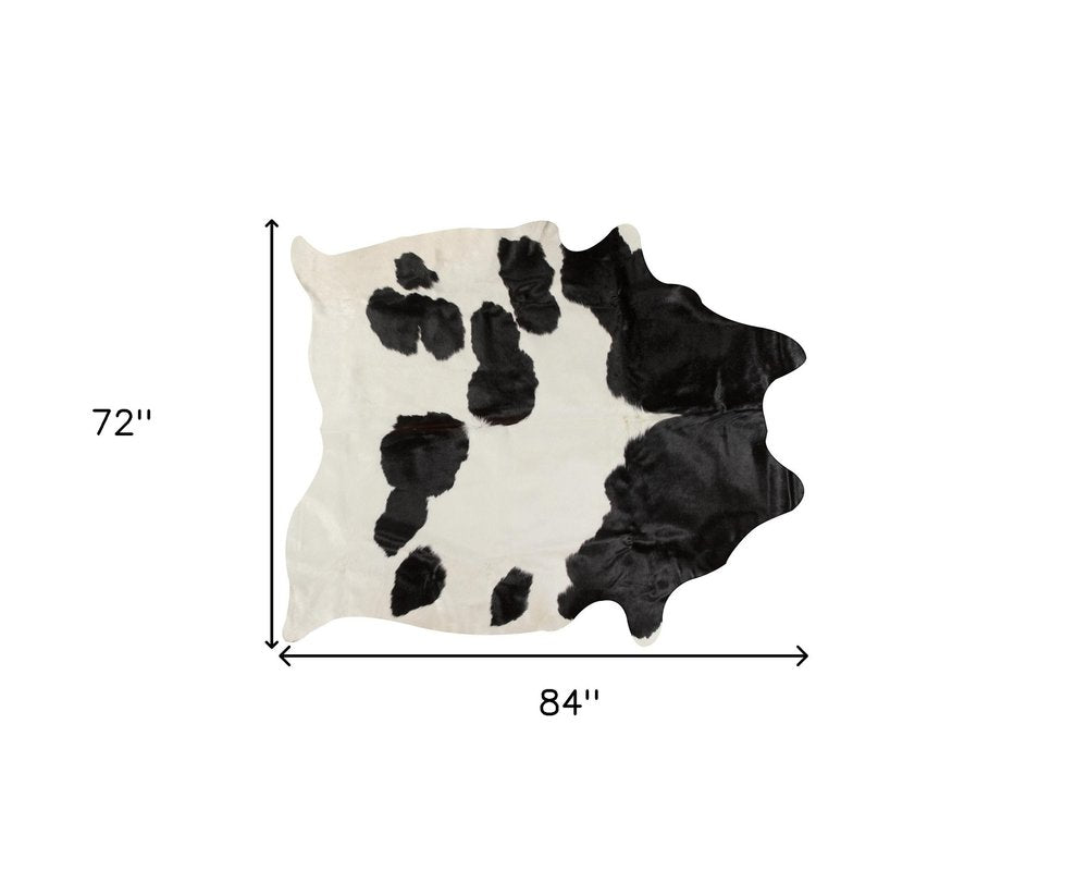 6' X 7' Brown And White Cowhide Area Rug