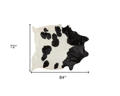 6' X 7' Brown And White Cowhide Area Rug