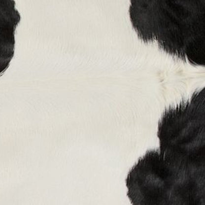 6' X 7' Brown And White Cowhide Area Rug