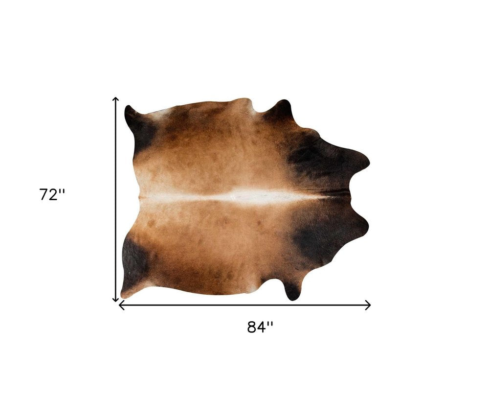 5' X 7' Brown And Black Cowhide Cowhide Print Area Rug