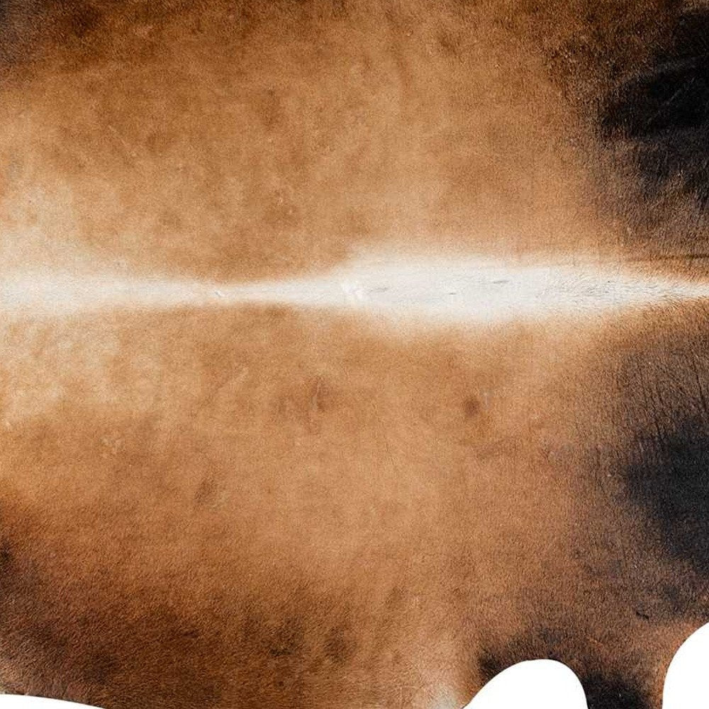5' X 7' Brown And Black Cowhide Cowhide Print Area Rug