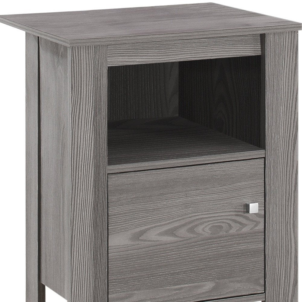 Gray wood end table with square top, open middle shelf, and front drawer with a small square knob.