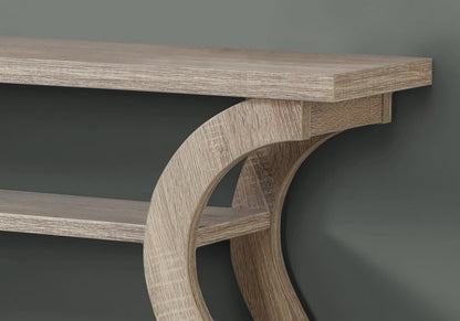 Taupe floor shelf console table with storage, featuring circular curved legs and two open shelves, set against a muted green wall.