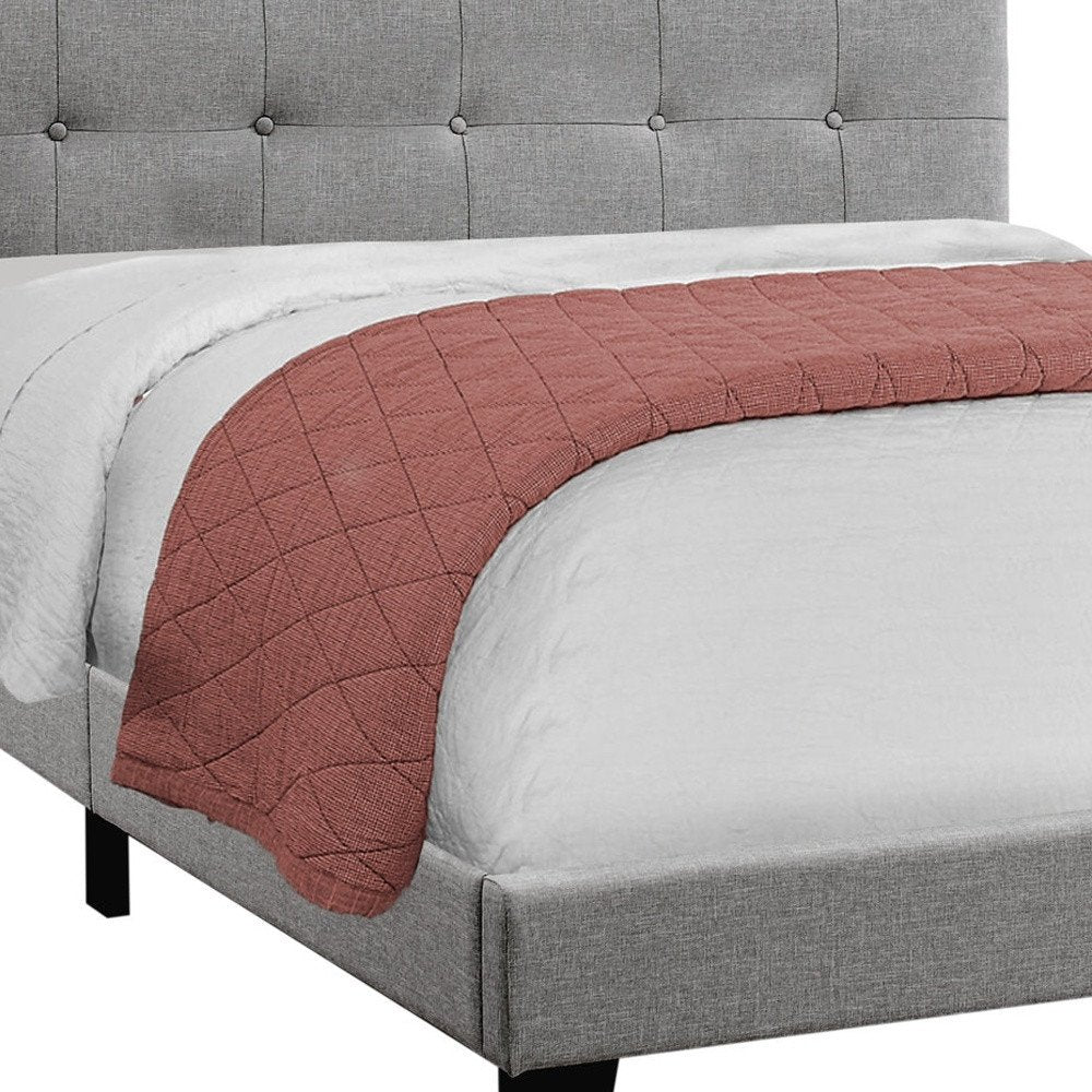 Gray queen tufted upholstered bed frame.