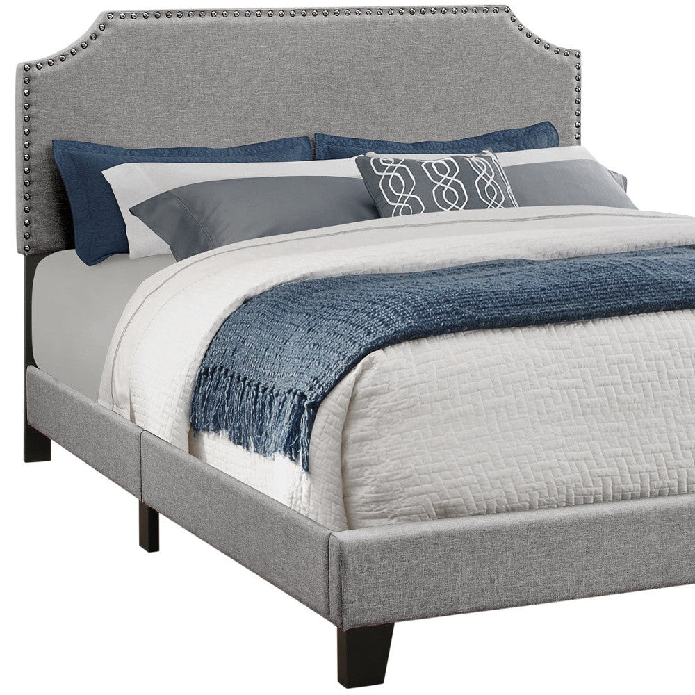 Gray Standard Bed Upholstered With Nailhead Trim And With Headboard