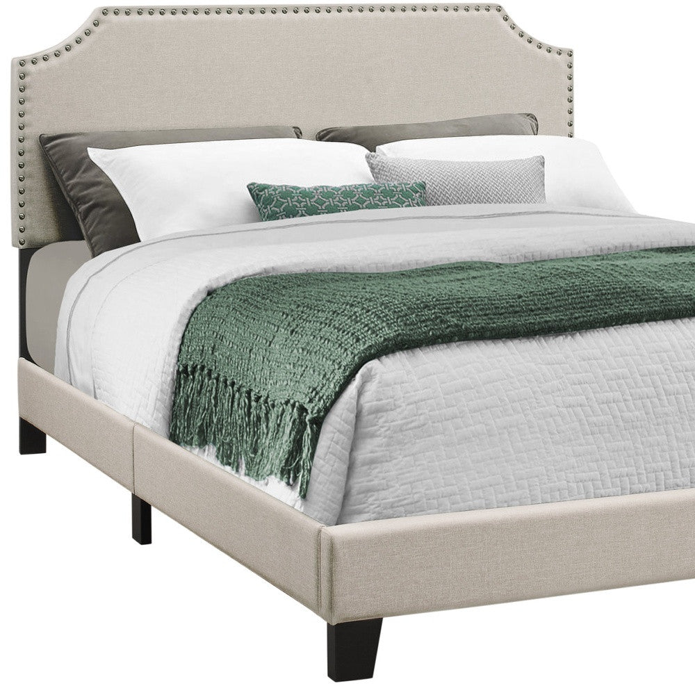 Gray Standard Bed Upholstered With Nailhead Trim And With Headboard