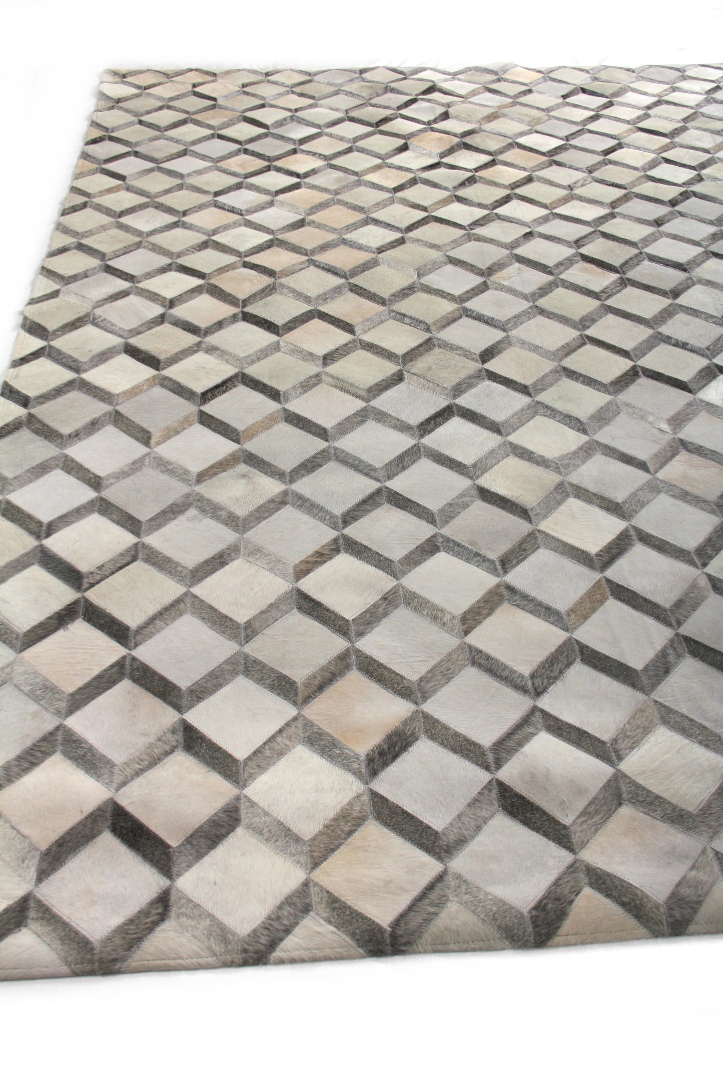 EXQUISITE RUGS   Natural Hide Indoor Hand Stitched    - 3334-5'X8'