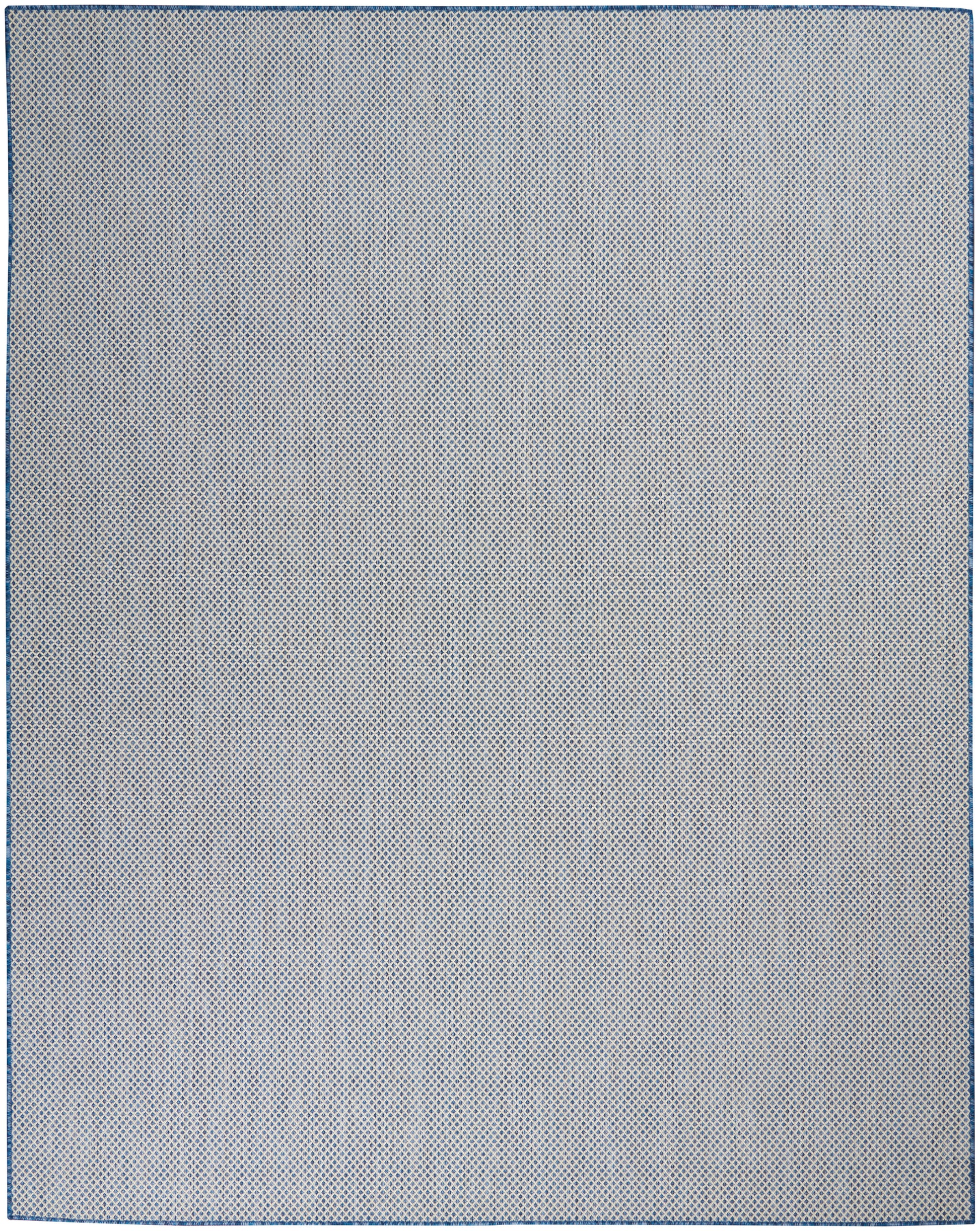 Rectangular rug in light gray-blue with a fine blue dot pattern and blue border.