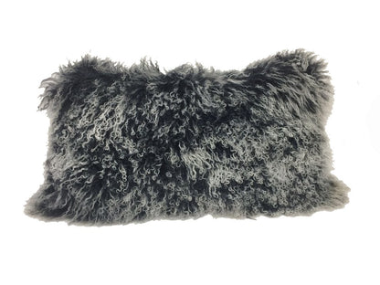 Rectangular black genuine Tibetan lamb fur pillow with microsuede backing, 17 inches.