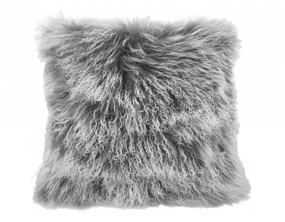 Square decorative pillow with long grey genuine Tibetan lamb fur.