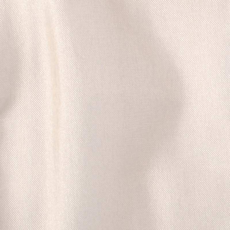 Cream-colored woven fabric close-up with soft shadows and smooth texture.