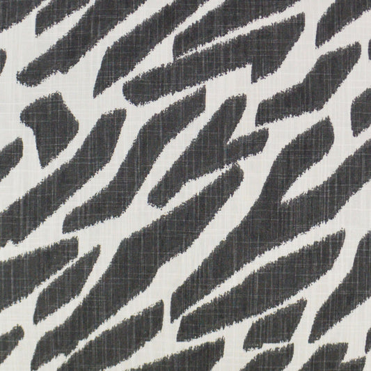 Black and white zebra-stripe fabric with a subtle woven texture, bold animal-print material for upholstery or apparel.