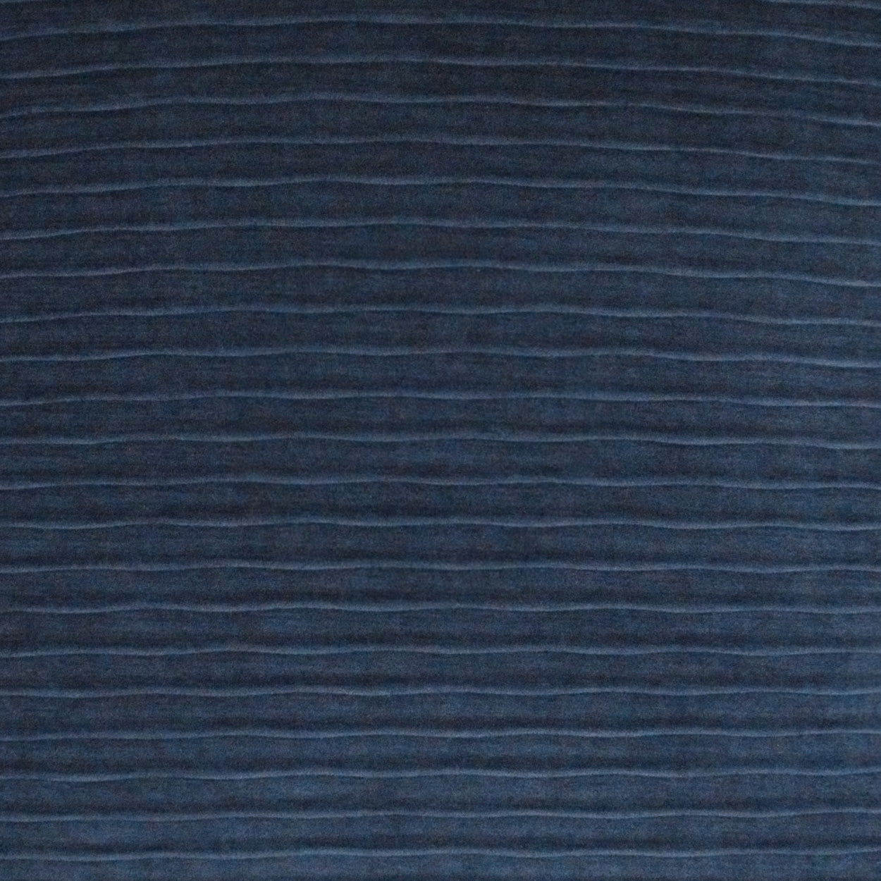Dark navy blue ribbed corduroy-like fabric with subtle horizontal ridges