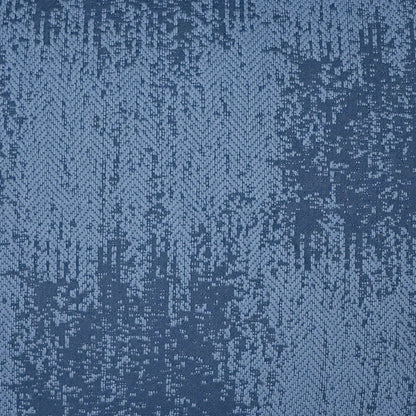 Blue snakeskin-patterned pillow with a textured tonal indigo weave (24" x 24").