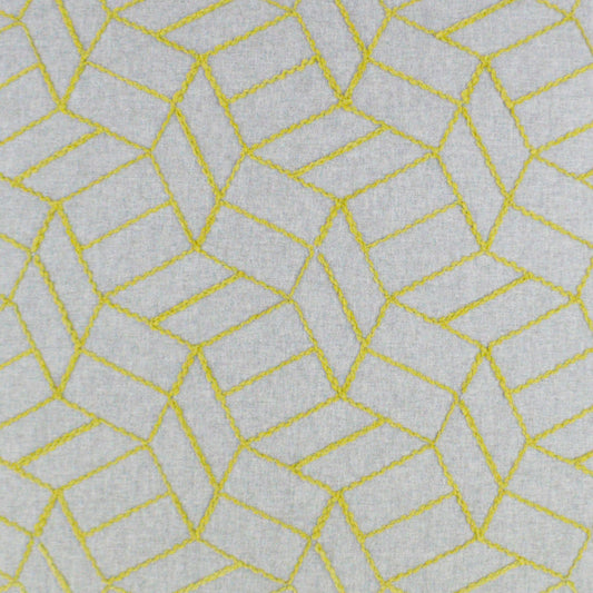 Gray fabric with bright yellow stitched geometric pattern of irregular polygons; modern decorative textile.