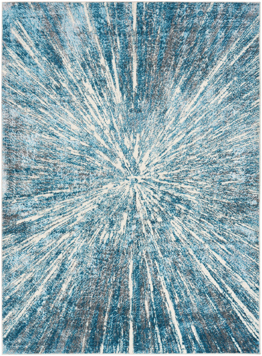 Blue and ivory abstract sunburst rug with radiating streaks and plush texture.