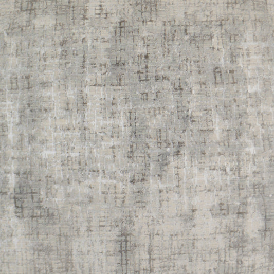 Neutral gray textured fabric with a subtle distressed geometric pattern; versatile upholstery textile.