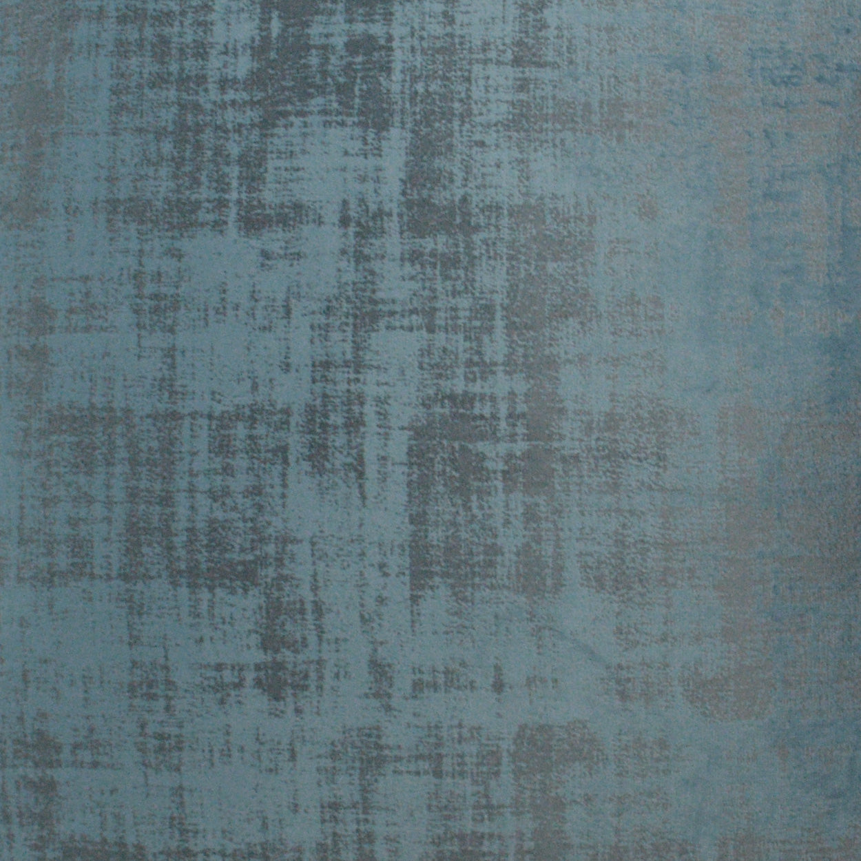 Blue textured fabric swatch with abstract brushstroke pattern, denim-like upholstery textile.