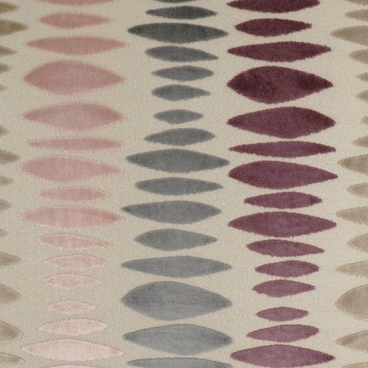 Beige fabric with vertical columns of pastel teardrop ovals in pink, blue-gray, mauve and tan.