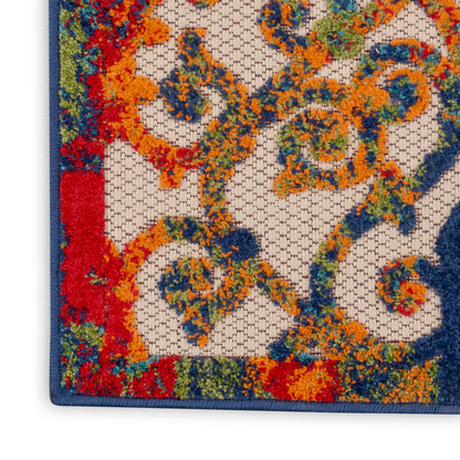 Vibrant oriental rug with orange and blue florals on beige lattice, blue border.