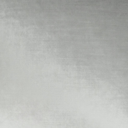 Gray fabric texture with grainy weave and soft gradient, suitable for upholstery or crafts.