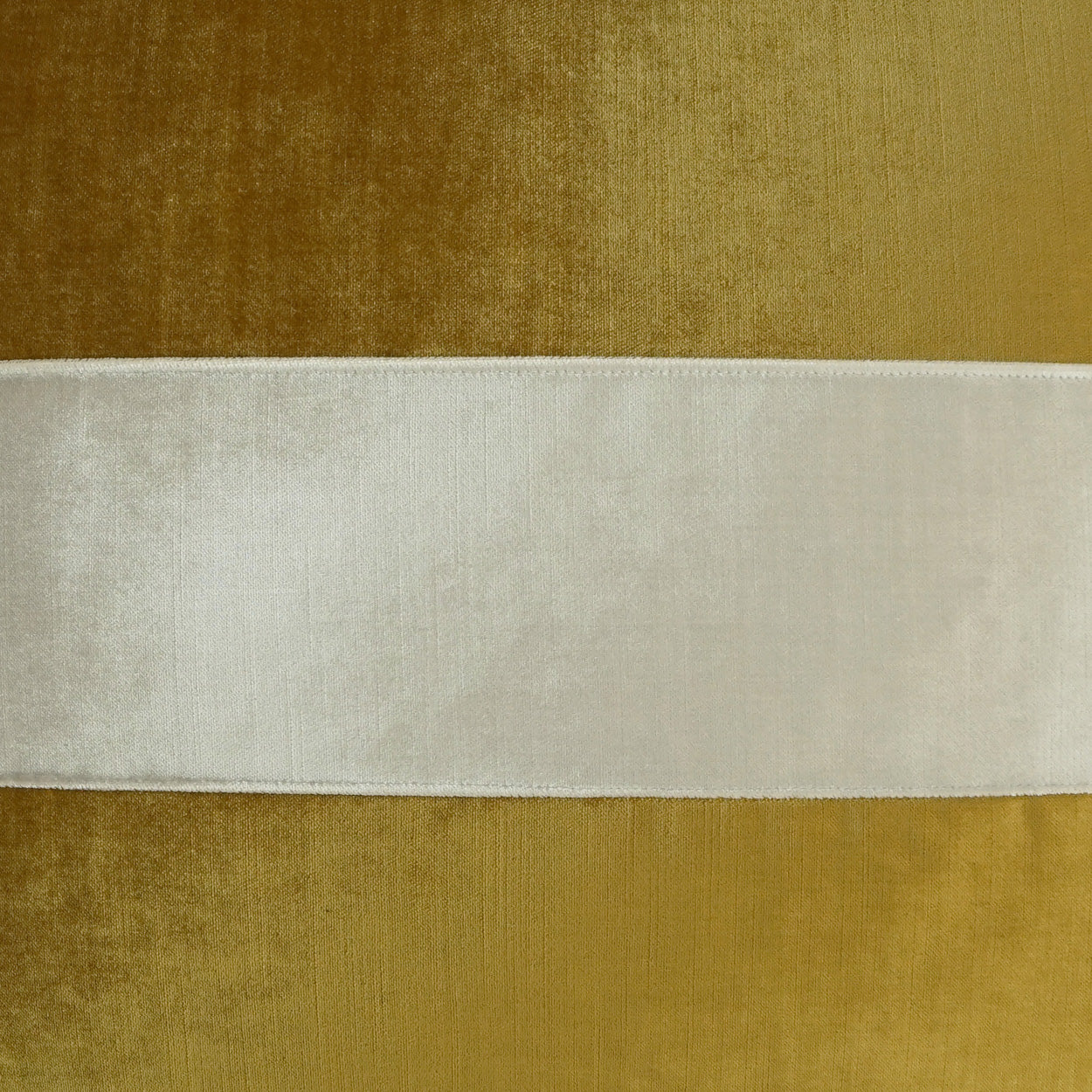 Gold-brown velvet fabric with a wide white satin band across the center.
