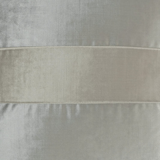 Close-up of light gray velvet fabric with a wide cream horizontal band, soft textile sample.