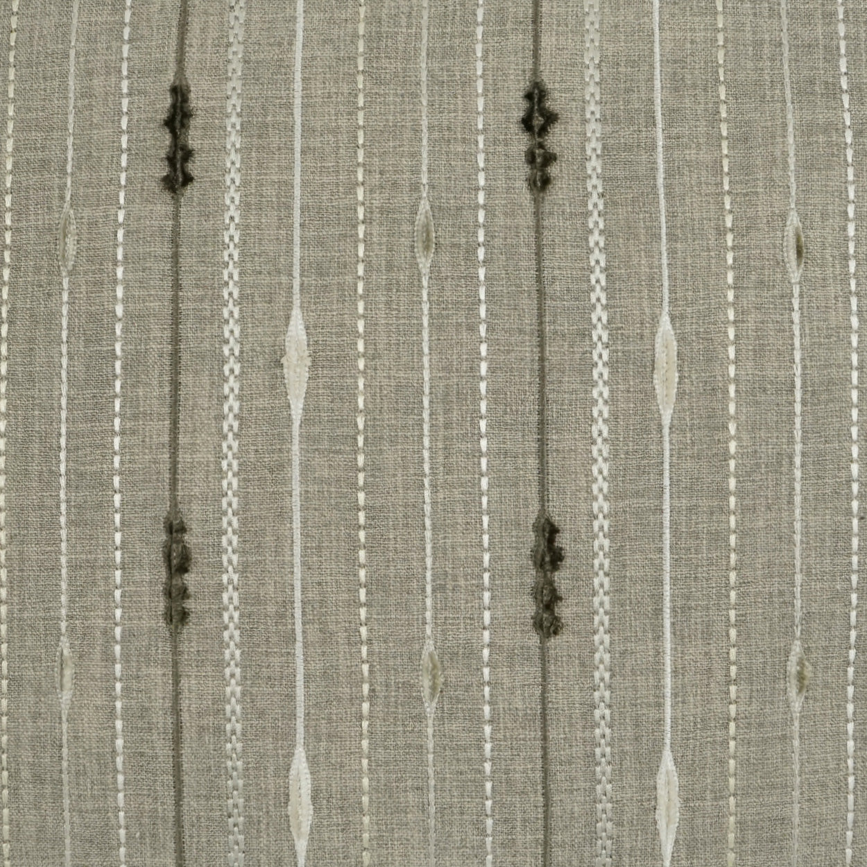 Beige woven fabric with vertical taupe stripes and ivory accents, subtle diamond motifs; upholstery or drapery textile.