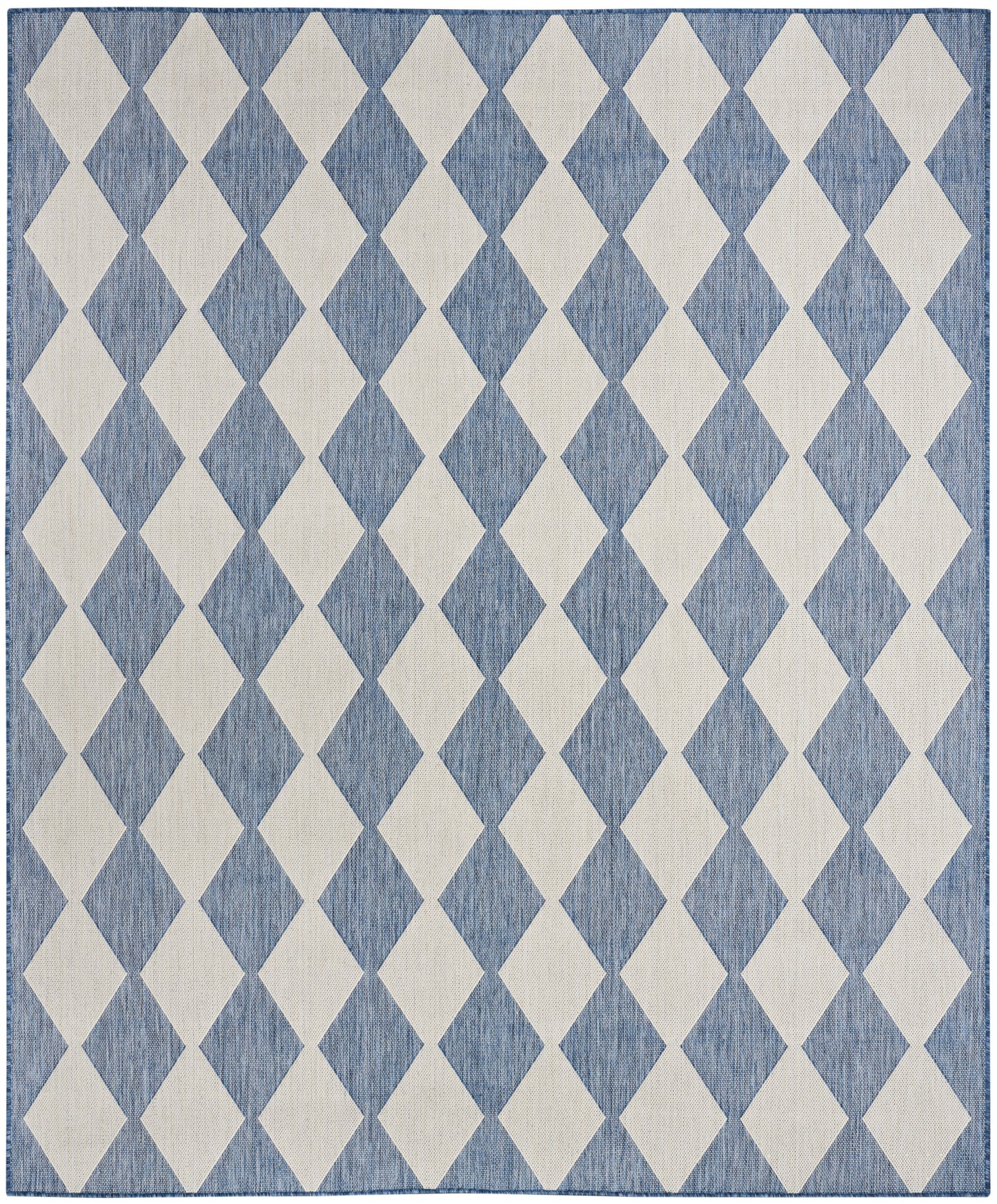Rectangular blue and ivory diamond-pattern rug with repeating harlequin diamonds for modern living room decor.