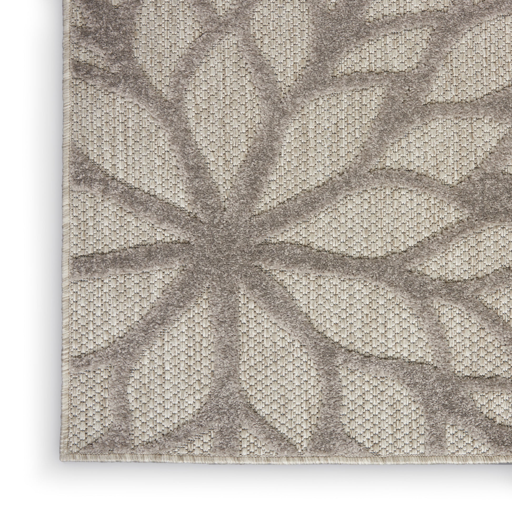 Neutral beige tropical runner rug with taupe leafy palm-frond pattern and textured woven surface, 6' long.