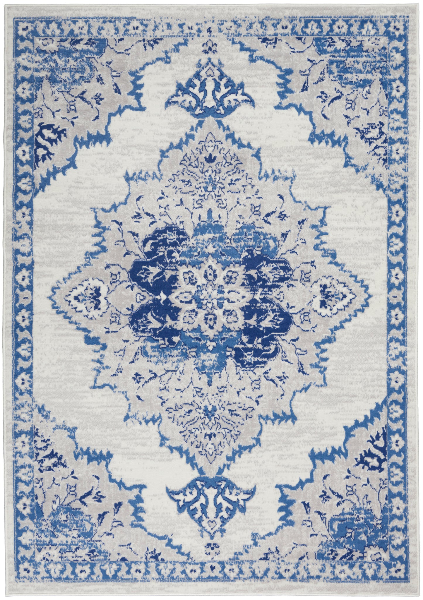Blue and white oriental rug with intricate central medallion and floral borders, rectangular decorative floor accent.