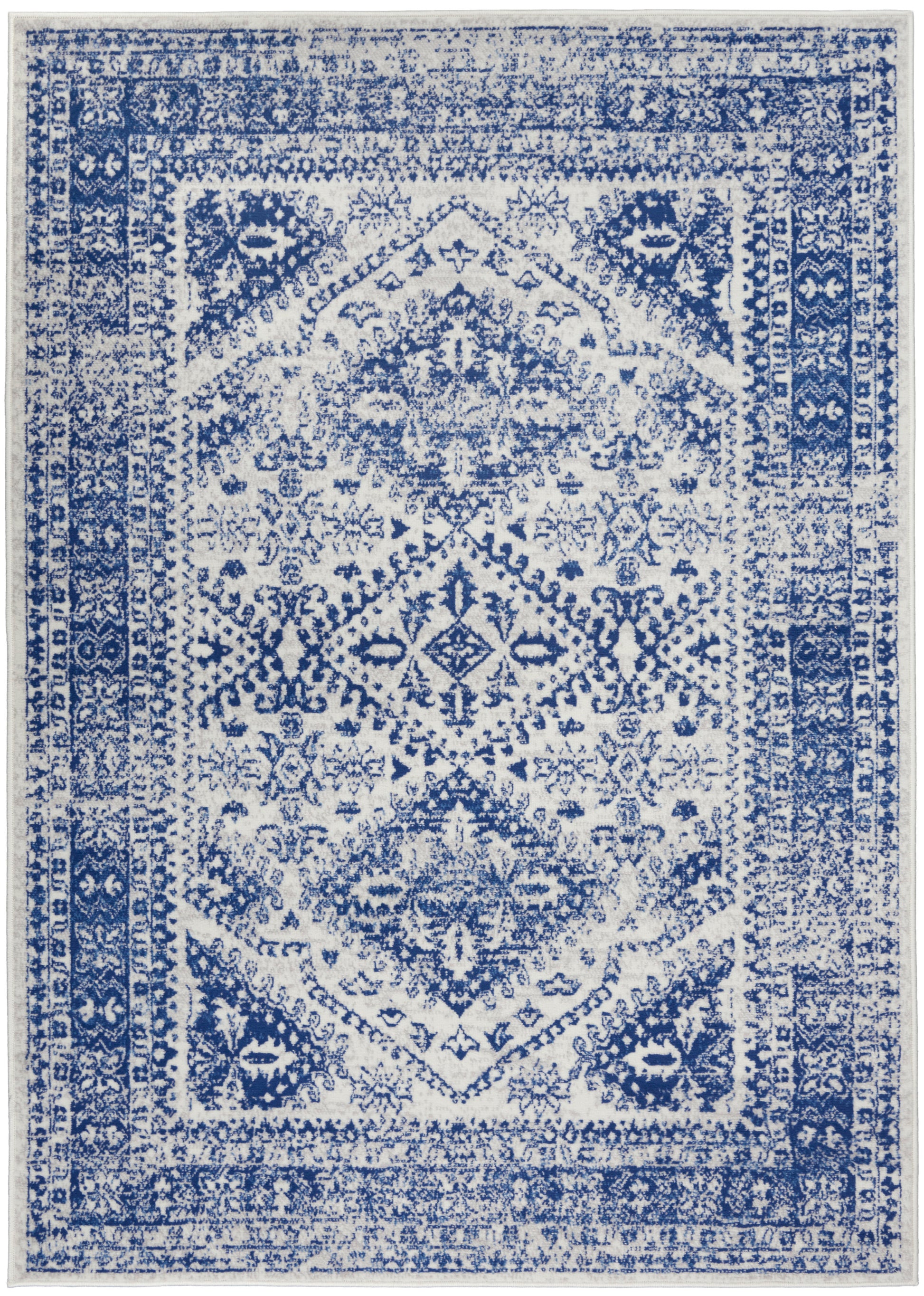 Blue & white distressed oriental rug with central medallion, ornate borders; rectangular area rug.