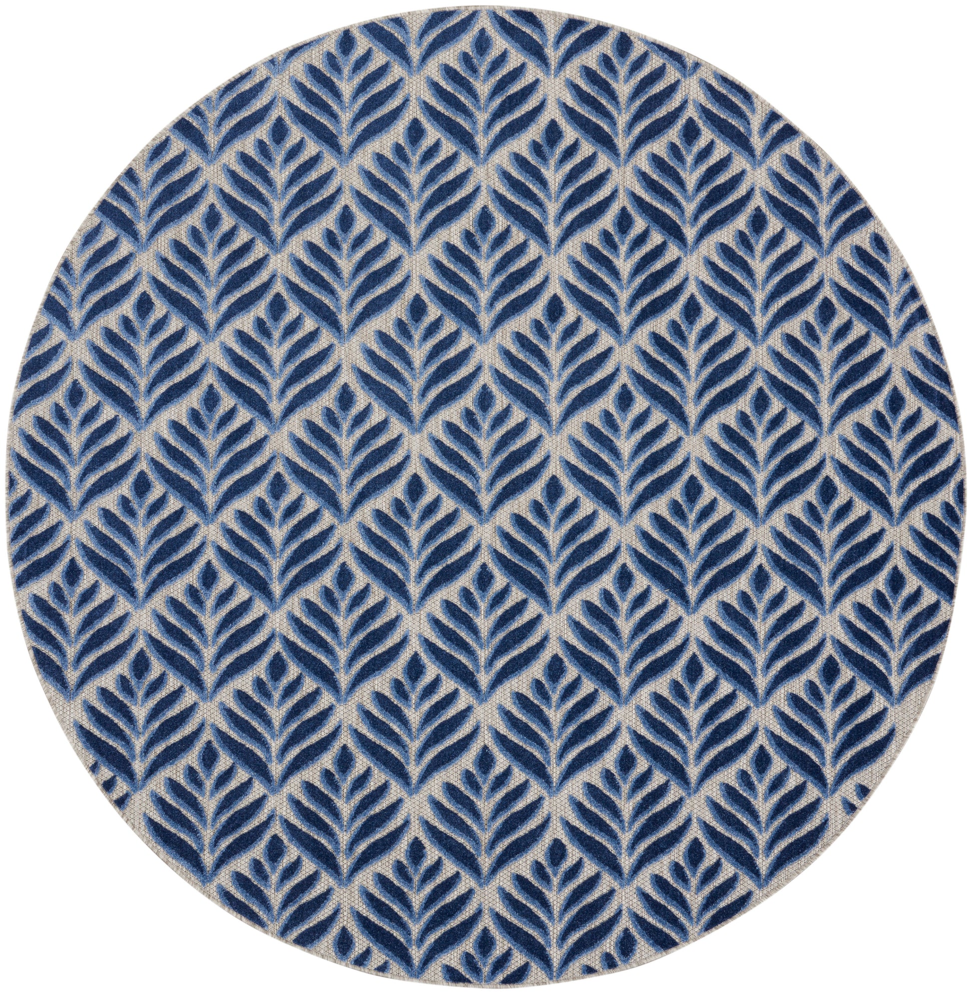 Round rug with navy blue leaf pattern on beige background; repeating botanical motif.