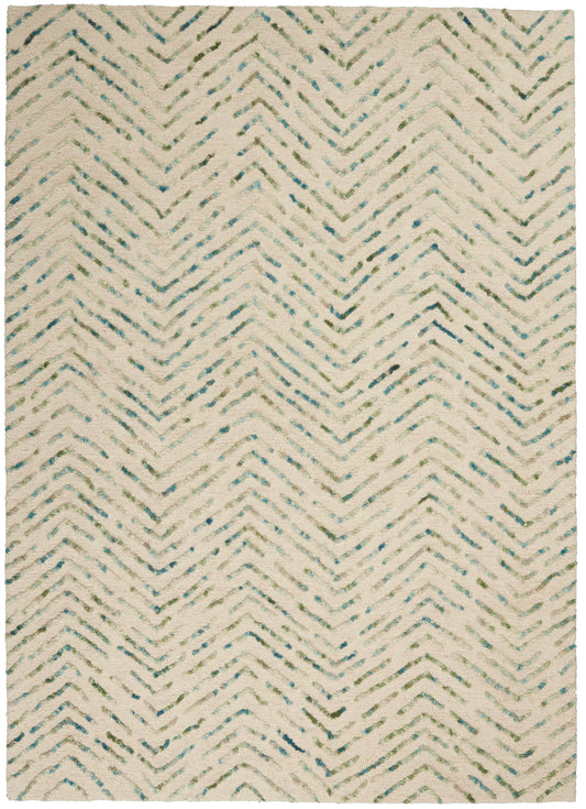 Cream textured wool rug with blue and sage green chevron zigzags; rectangular, boho-style.