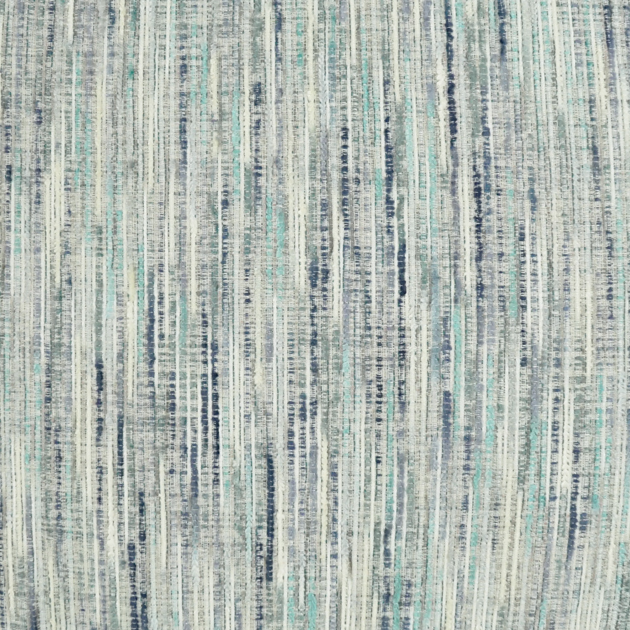 Soft woven fabric with vertical blue and teal stripes on a light gray background; versatile for upholstery or rugs.