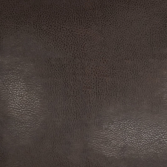 Dark brown pebbled leather texture close-up; versatile leather material for upholstery, bags, or wallets.