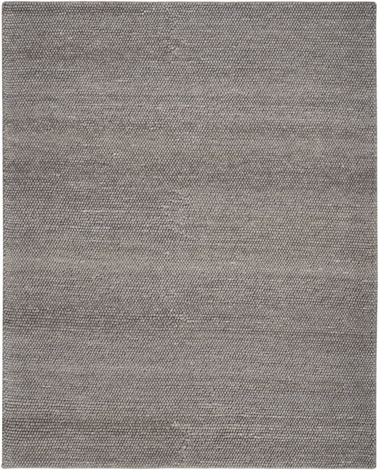 Gray-beige rectangular textured rug with tiny pebble pattern, woven surface for living room decor.