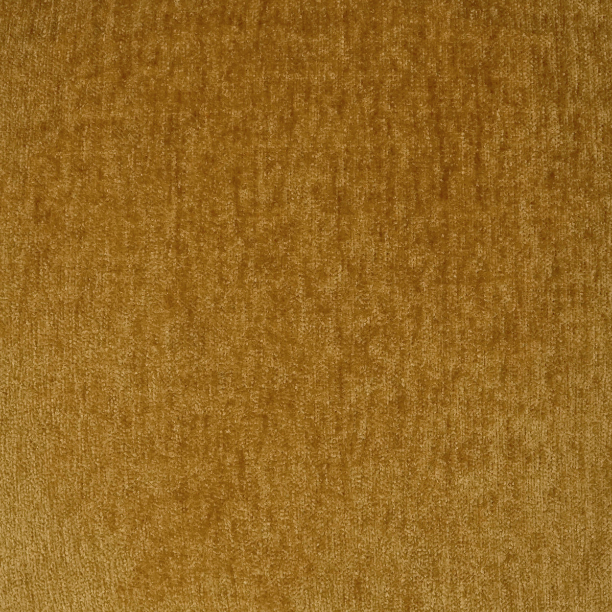 Golden-brown velvet-like fabric with plush nap; ideal upholstery or drapery material.