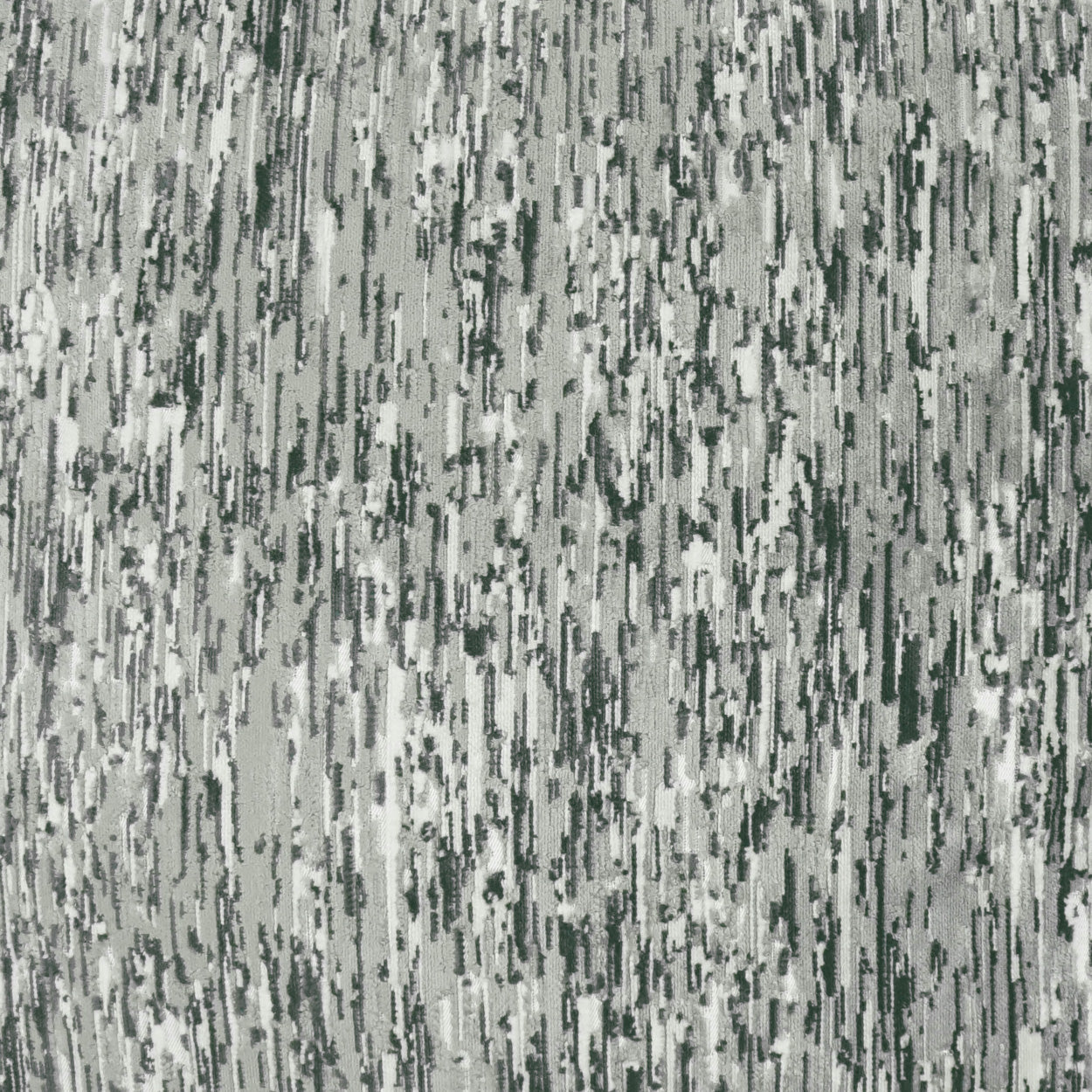 Gray fabric with irregular dark green vertical streaks; abstract textured textile.
