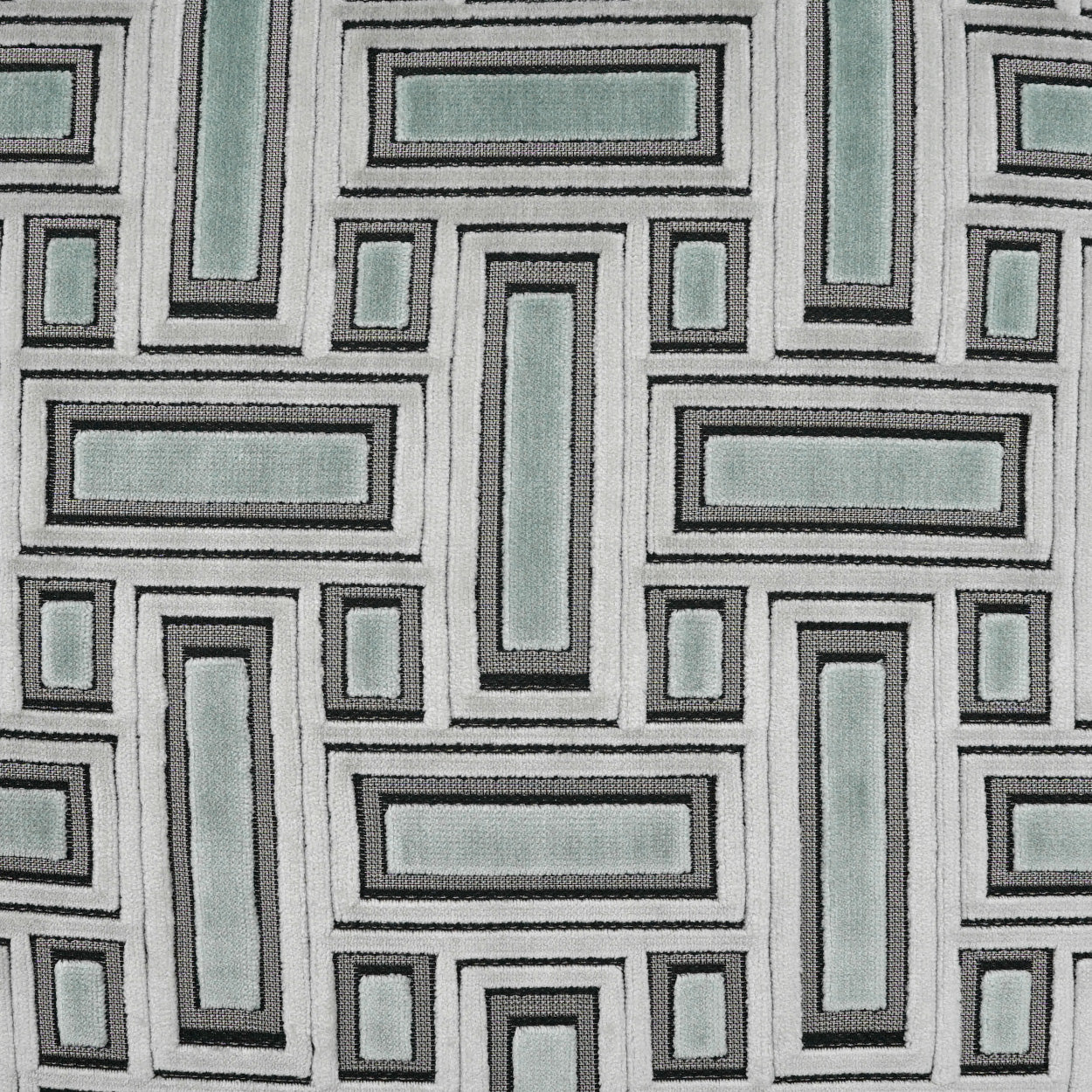 Geometric maze pattern fabric with interlocking rectangles in black, light gray and sage green; modern upholstery textile.