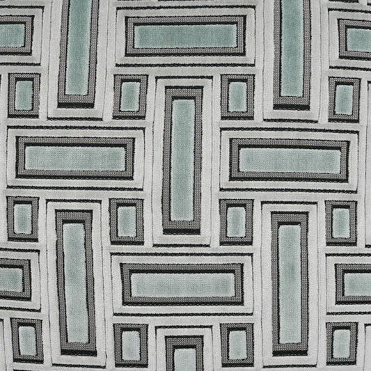 Geometric maze pattern fabric with interlocking rectangles in black, light gray and sage green; modern upholstery textile.
