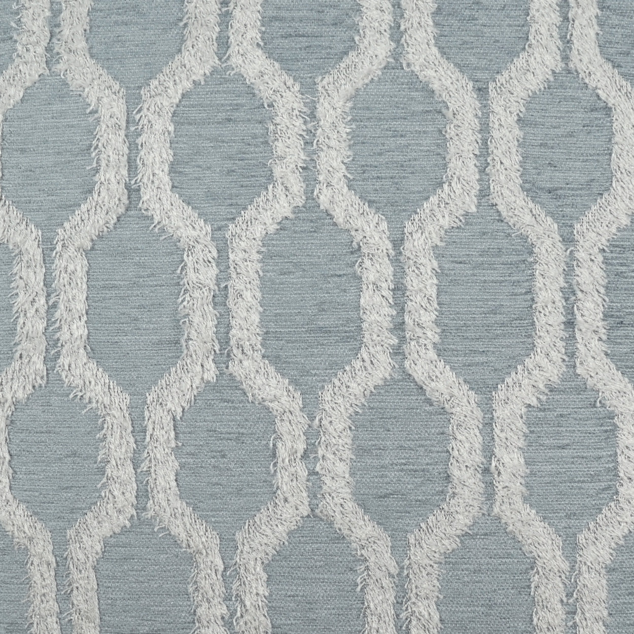 Blue-gray woven fabric with a white geometric trellis lattice pattern of elongated oval shapes.
