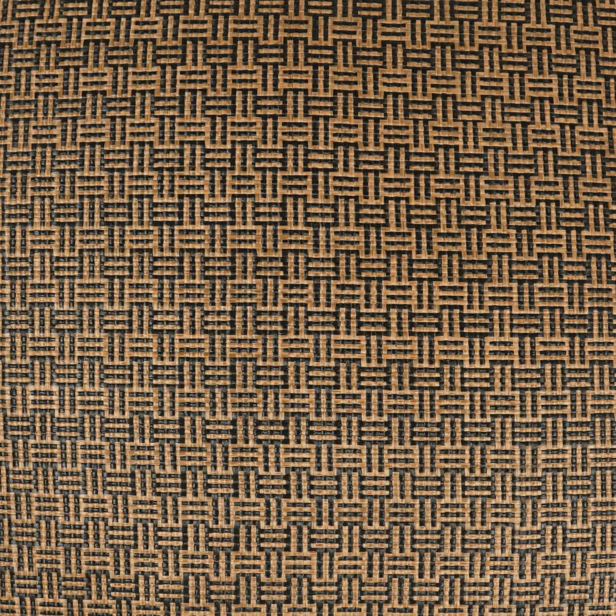 Tan and black basket-weave fabric texture with a geometric interlaced pattern for upholstery or bags.
