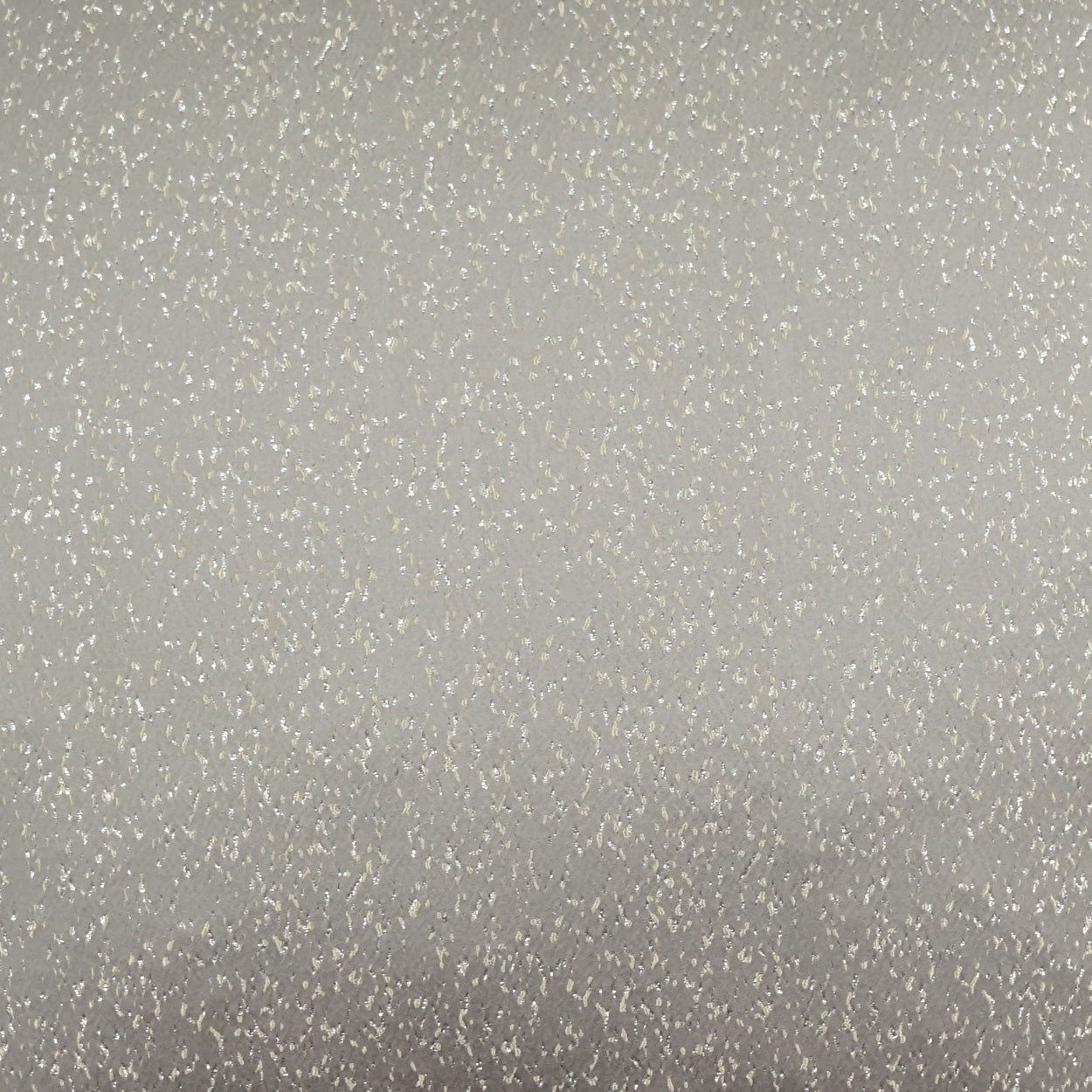 Light champagne fabric with metallic glitter specks and a soft shimmering finish.
