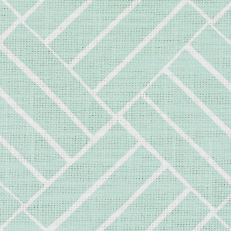 Seafoam print on woven fabric with a white geometric lattice grid of interlocking rectangles.