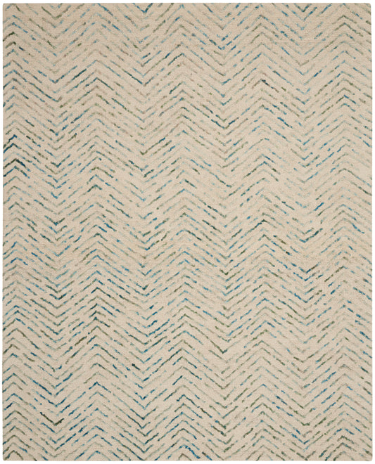 Cream rug with blue-teal chevron zigzag pattern; woven textile, casual coastal-style floor covering; 8' x 12'.
