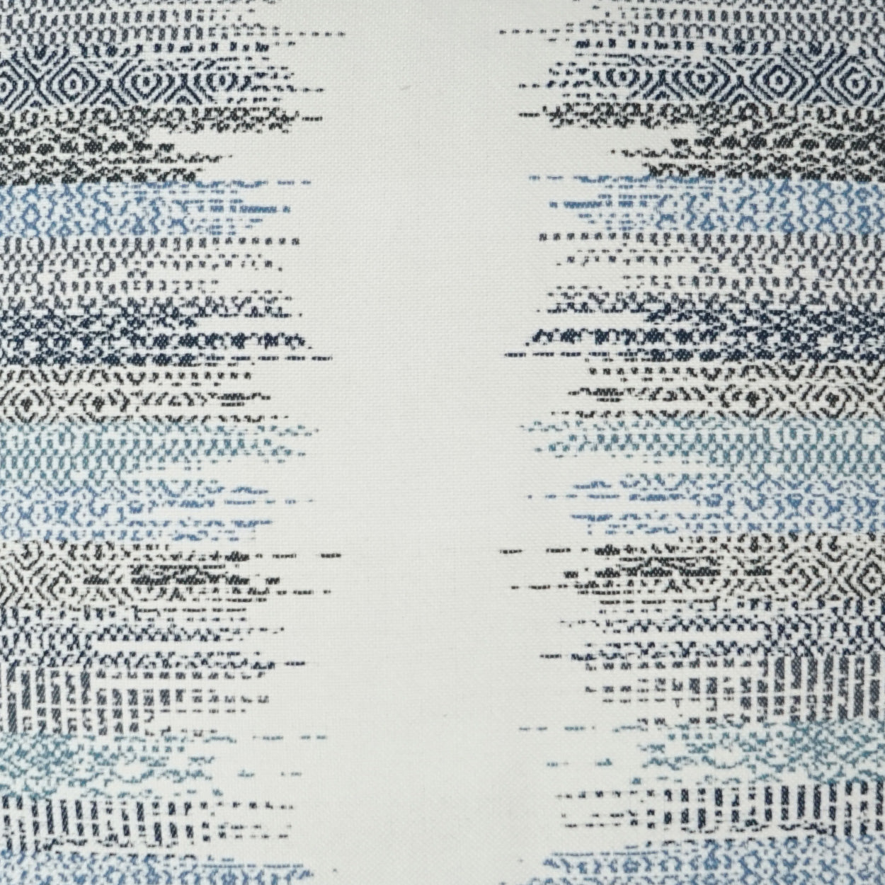 Cream fabric swatch with blue and black geometric pattern, abstract textile print.