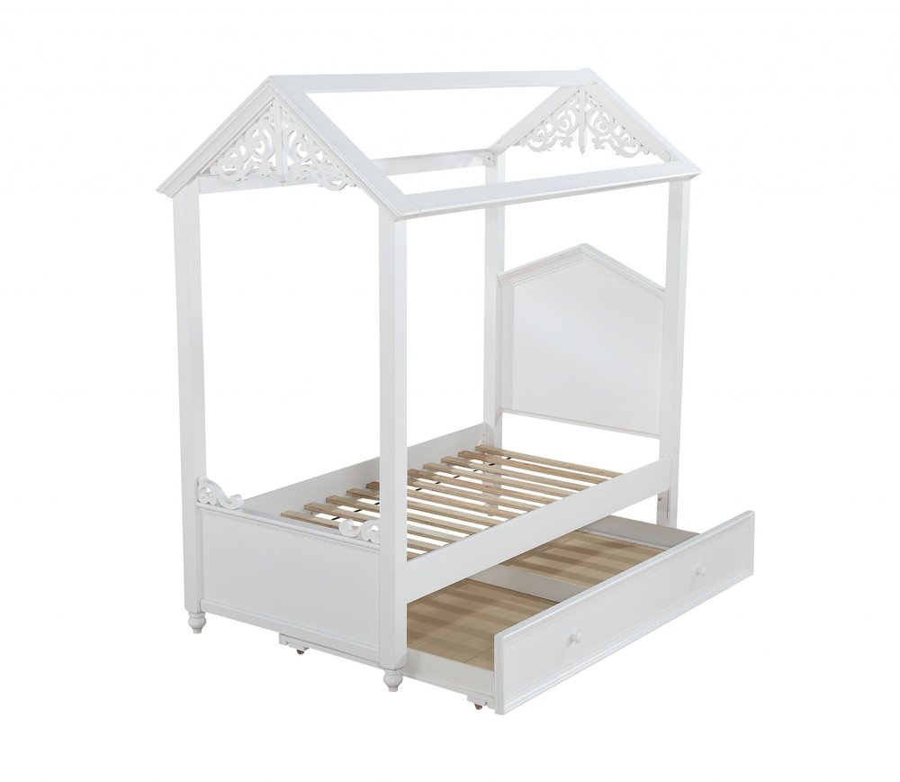 White wood twin canopy bed frame.