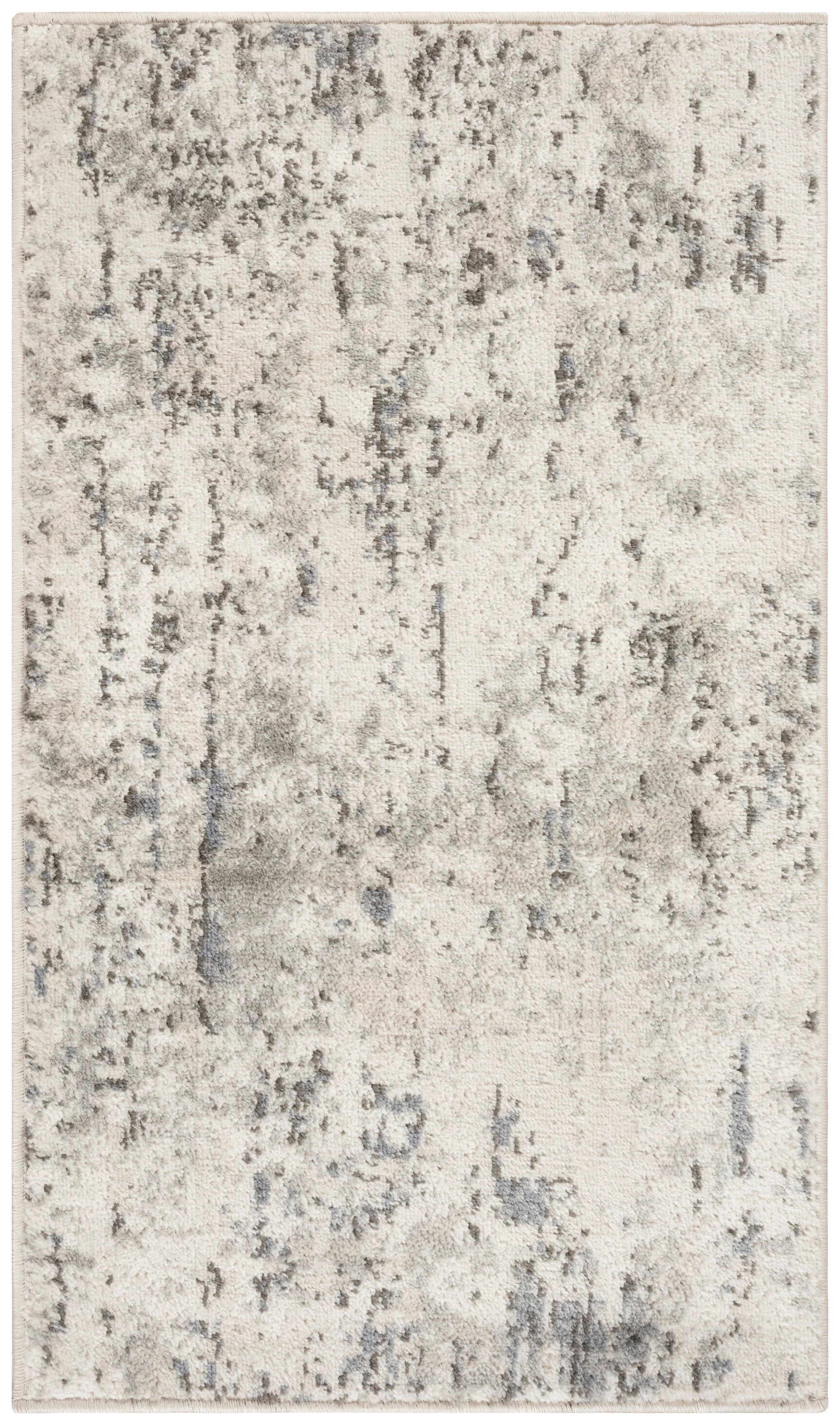 Rectangular abstract distressed rug in ivory with gray-beige mottling; modern, low-pile rug.